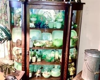Antique curved glass china cabinet, large collection of Jadeite glassware, depression glass, large elephant collection