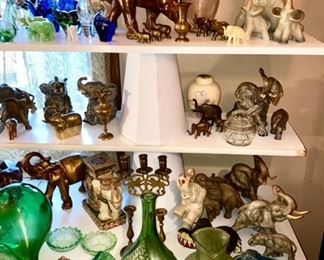 Elephant collectibles, green glass bottles, etc.