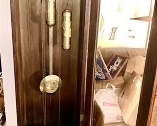 Grandfather clock, front view w/ door open