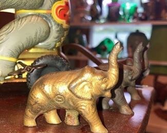 Cast iron elephants (one marked with an "H")