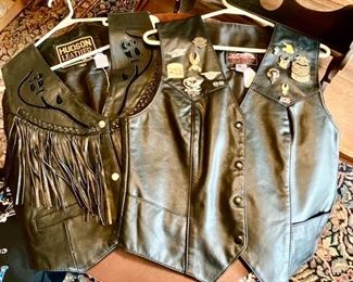 2 vintage leather women's vests, one w/ several motorcycle pins (Harley Davidson, etc)