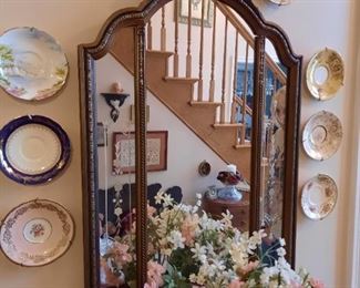 . . . what's not to love about this stunning mirror surrounded by "orphans"?!  To me this says something about the owner, a sensitive heart I gather, as she gave a home to these saucers that had lost their cups -- what a neat idea!