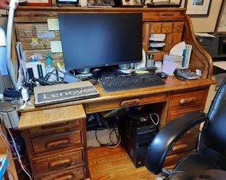 . . . this is a great roll-top desk with a bunch of neat cubbies.