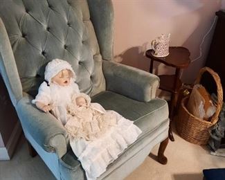 . . . a nice accent chair with resting dolls