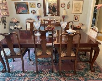 . . . a beautiful formal dining set with ball and claw feet!