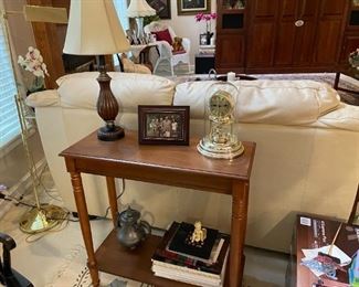 . . . a nice sofa table with lamp and clock