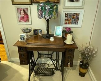 . . . an early 1900's Singer sewing machine -- I use mine as a TV stand -- what about you?
