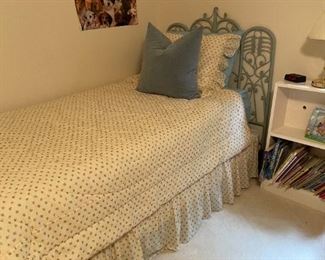 . . . this is one of two wicker-style twin beds -- perfect for brothers, sisters, or sleep overs