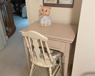 . . . a sewing machine doubling as a child's desk
