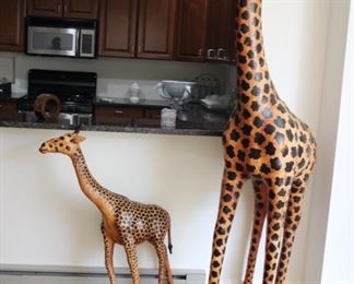 Leather clad life size giraffes
