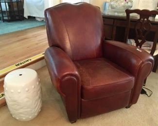 Comfortable leather recliner chair (will recline to a complete lying-down position)