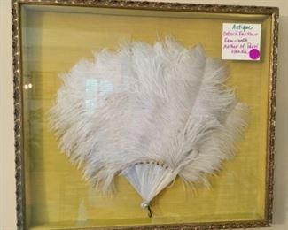 Antique ostrich feather fan with mother-of-pearl handle
