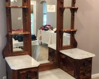 Gorgeous Eastlake washstand with ornate mirror and shelves