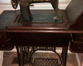 Antique Singer sewing machine with original table. No. AB863757.