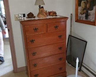 chests of drawers, lamps, framed art