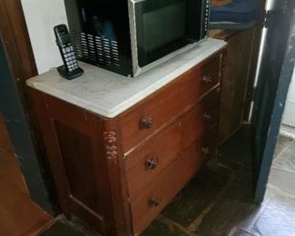 marble and walnut chest of drawers