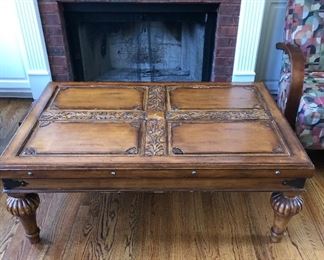 Large wood cocktail table.