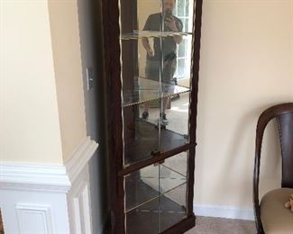 Corner, lighted display case.