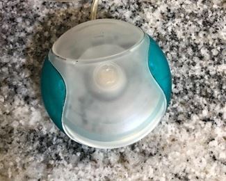 Vintage Apple Mac Clamshell laptop with accessories.