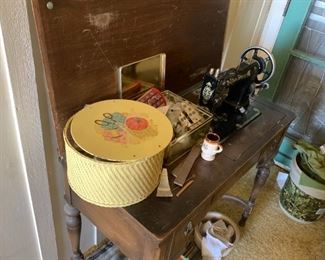 Antique sewing machine is up for grabs as well as the vintage trimmings