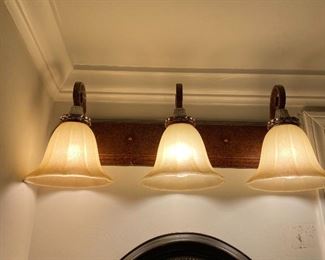 Two sets of this vanity lights