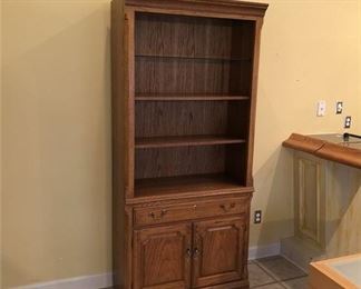 14. Thomasville Oak Bookcase with Glass Shelves