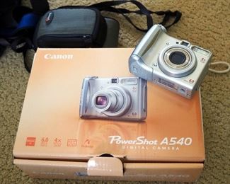Canon Powershot Digital Camera Model A540 With Carrying Case In Original Box And Sony Handycam Video Recorder With Carrying Case, Manual, And Charger