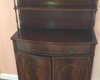 Mahogany inlaid chest with drawer and two doors and open display top from Stiehl Furniture Co.