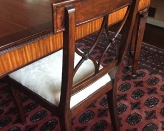 Beautiful dining room inlaid table (over 100 years old) with three chairs.