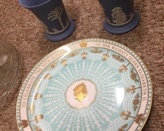 Decorative plates and Wedgewood cups.