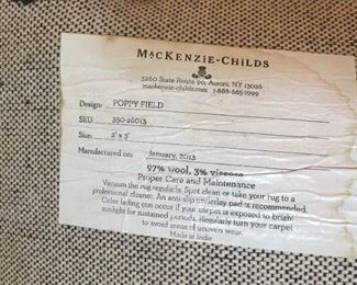 MacKenzie-Childs floral carpet.