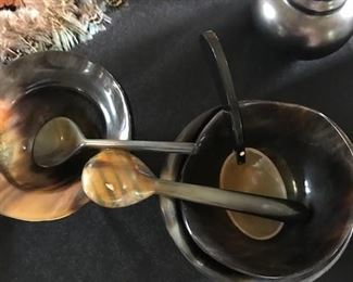 Set of small bowls with ladles.