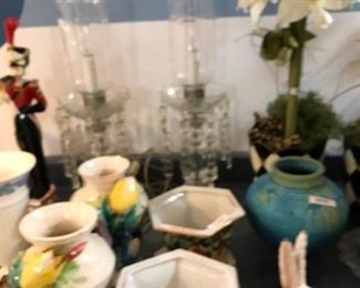 Nice selection of vases and planters with artificial flowers.