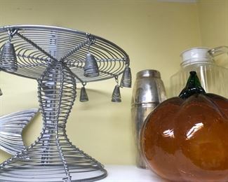 Assorted serving pieces and decorative items.