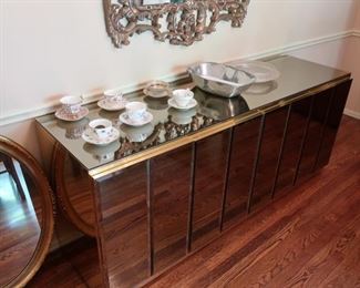 Mirror  finish  buffet  It  has  storage  underneat.  It  is  72"  wide,20"  deep  and  30"  tall.