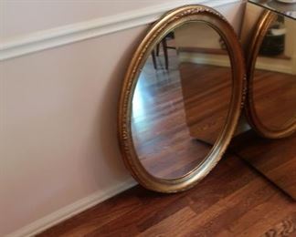 oval  mirror   It is  25 1/2"  wide  by  32"  tall.