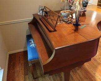 1.   Kimball  piano-  Keys  all  work.  Bench is  needlepoint  pattern  The  price  is 295.00  obo