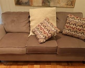 3  cushion  gray  sofa  by  La  Z  Boy  It  is  36"  deep  and  86"  wide