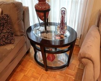 Oval  table with  beveled   glass  insert-  it  is  23"  deep by  29"  wide 