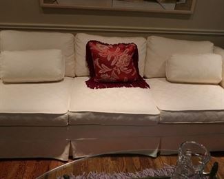 3  cushion white  sofa-  it  is 91" wide  by  34"  deep