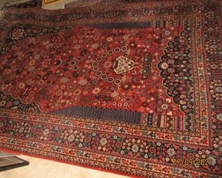 red and blue rug 8' x 5' 4"