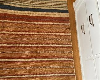 woven rug 7'10" x 5'2". $290