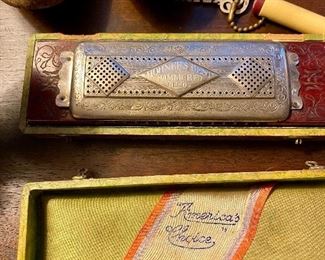 "Hohner's Best" harmonica.