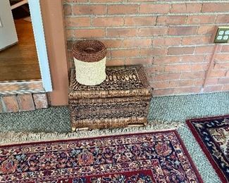 Hinged storage basket.