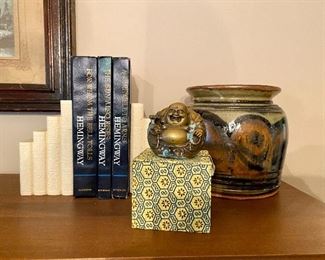 Laughing Buddha figure.