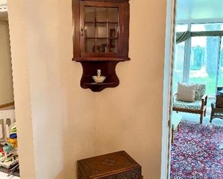 Cute hanging corner cabinet.