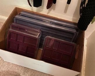 Sectioned jewelry drawer cases.