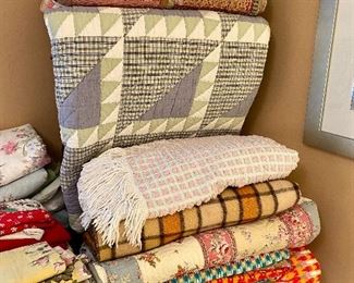 Pretty quilts and coverlets.