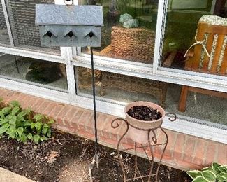 Shepherd's hooks & plant stands.