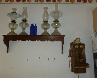 Old Oil lamps & telephone (not old)